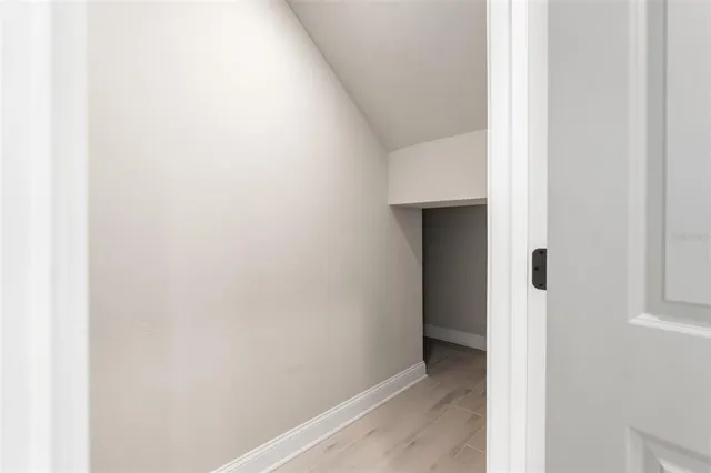 a view of an empty walk in closet
