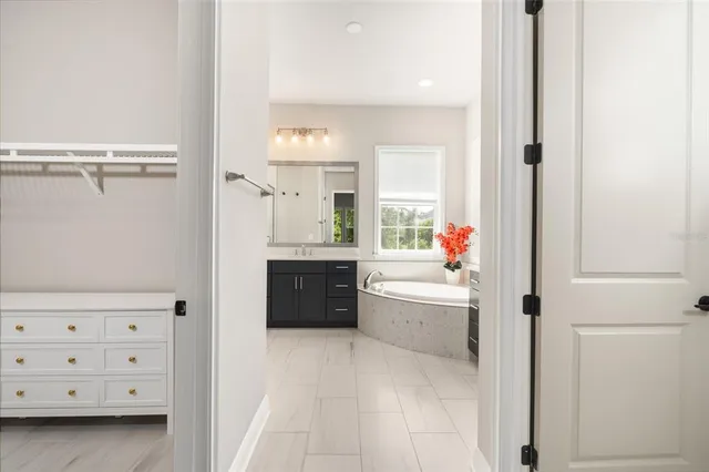 a view of an empty room with a window