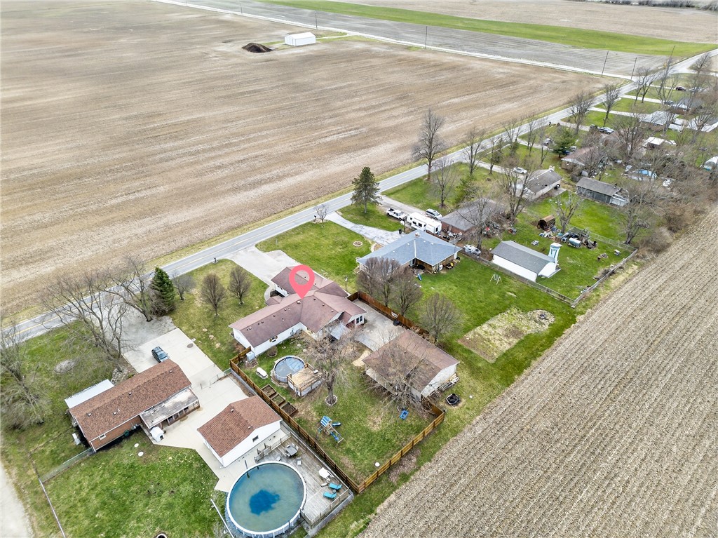 7888 Darke-Preble County Line Road Arcanum, OH 45304 - Photo 50 of 51 An aerial view showcases a residential property nestled amidst expansive fields, offering a private retreat.