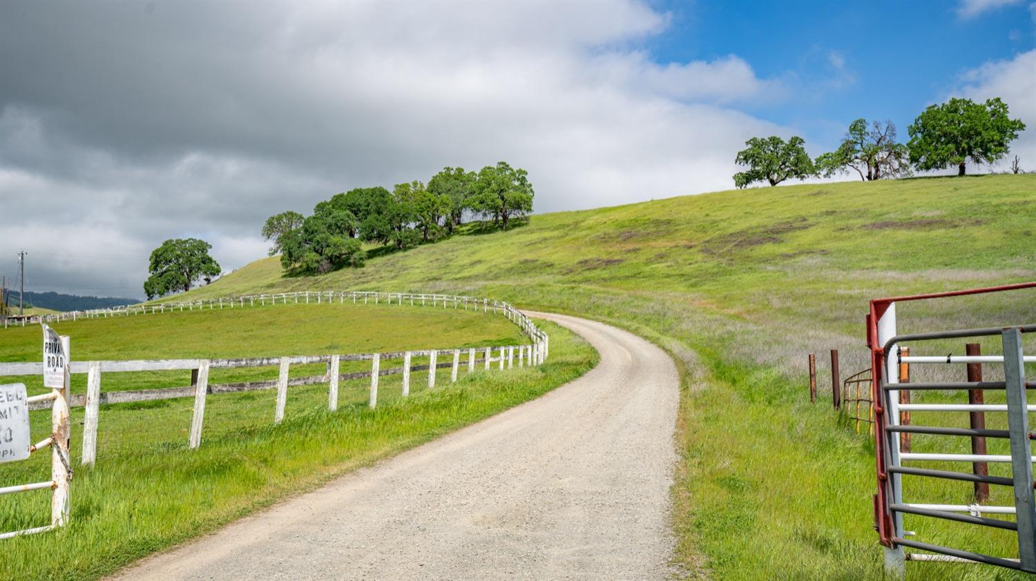 30247 Pleasant View Road Winters, CA 95694 - Photo 2 of 54 a view of a swimming pool with an outdoor space and seating area