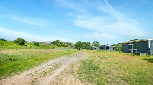a view of a golf course with a garden