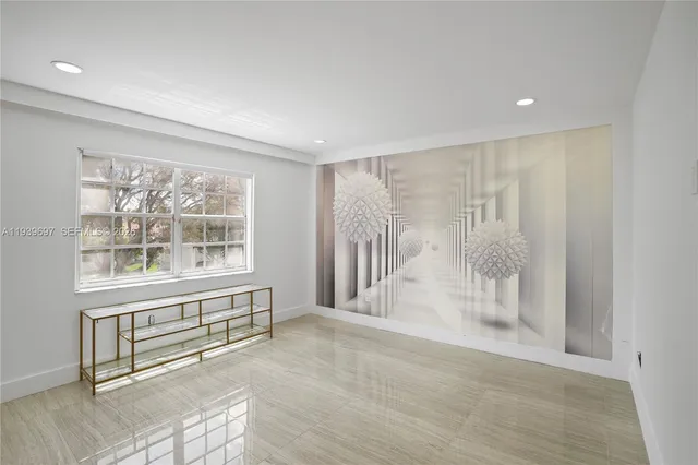 a bathroom with a glass door shower and a sink