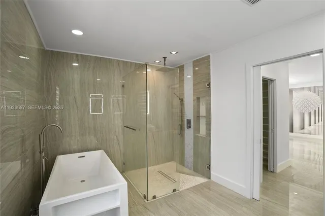 a view of a house with a yard and a garage