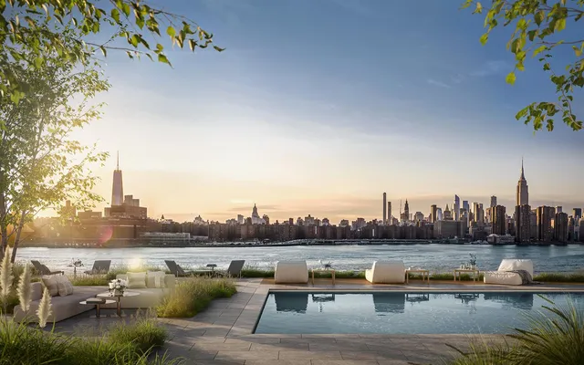 a view of swimming pool next to a lake view