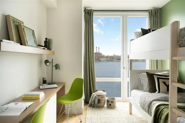 a living room with furniture a window and a sink