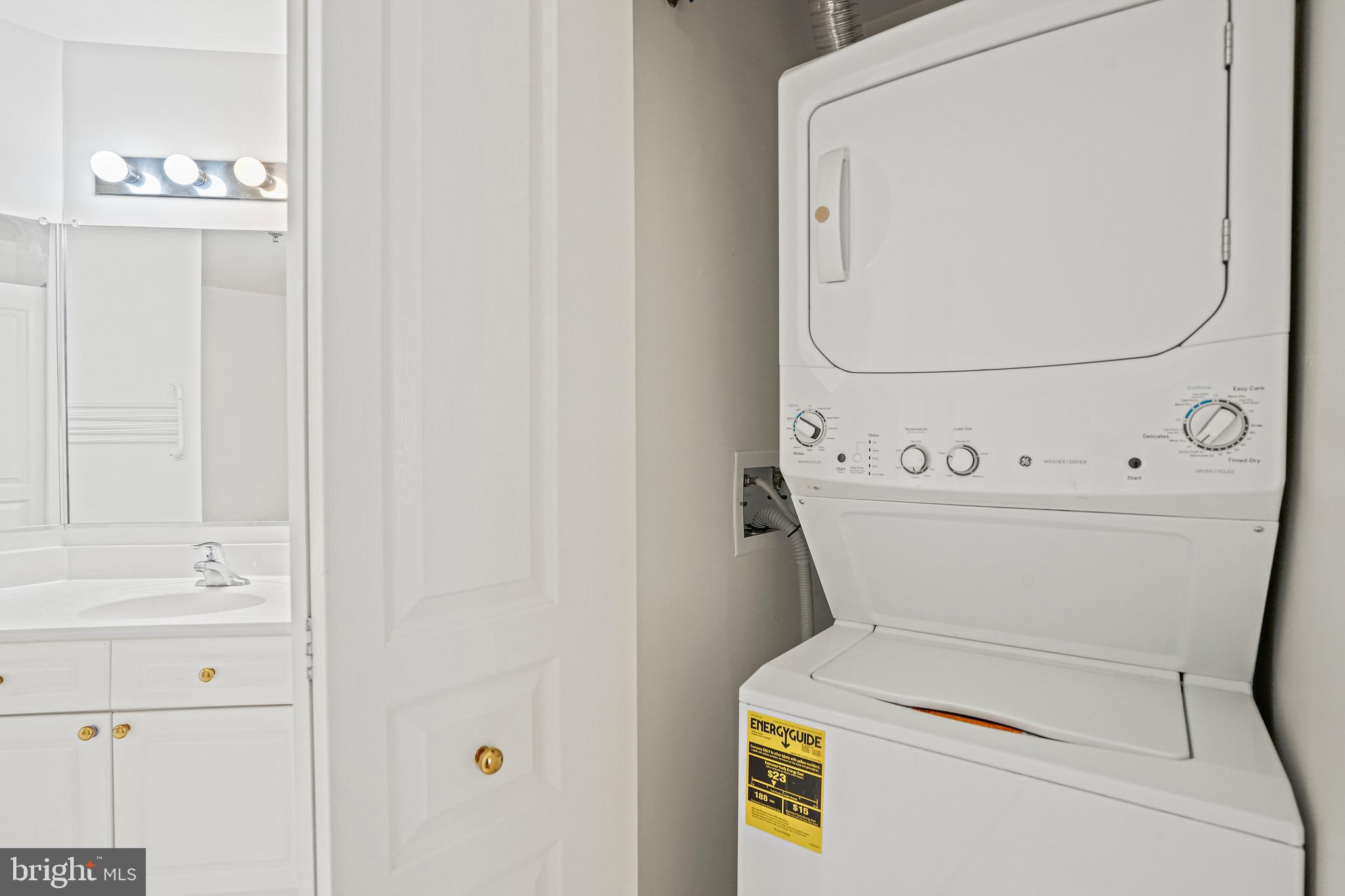 5565 Seminary Road, Unit 113 Falls Church, VA 22041 - Photo 16 of 19 a utility room with dryer and washer