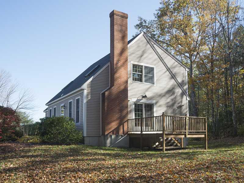 8 Days Mill Road Kennebunk, ME 04043 - Photo 24 of 34 Exterior Back. Sunny yard