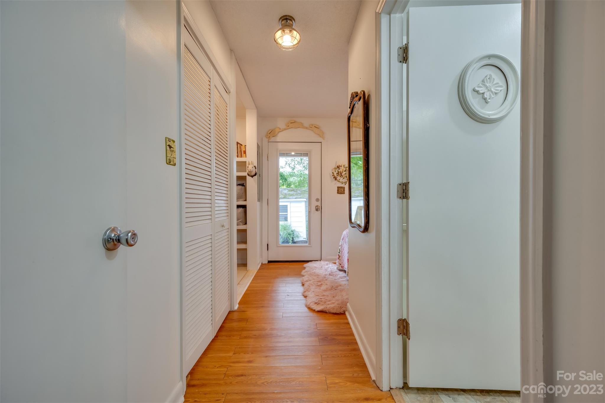 196 Screven Road Tryon, NC 28782 - Photo 16 of 31 a view of a hallway with wooden floor