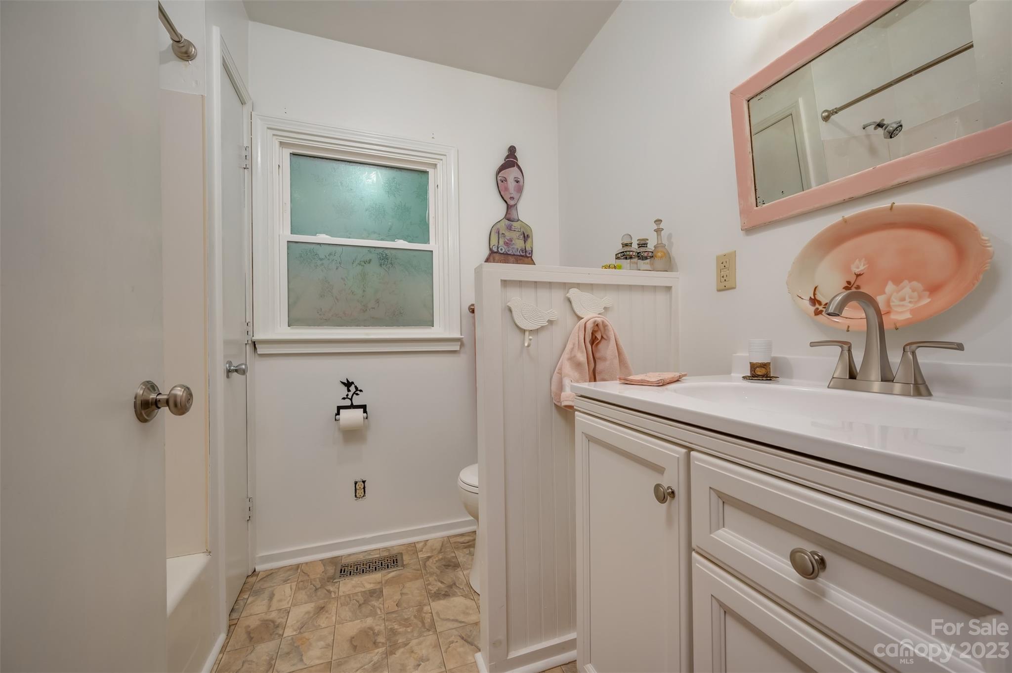196 Screven Road Tryon, NC 28782 - Photo 17 of 31 a bathroom with a sink and a mirror