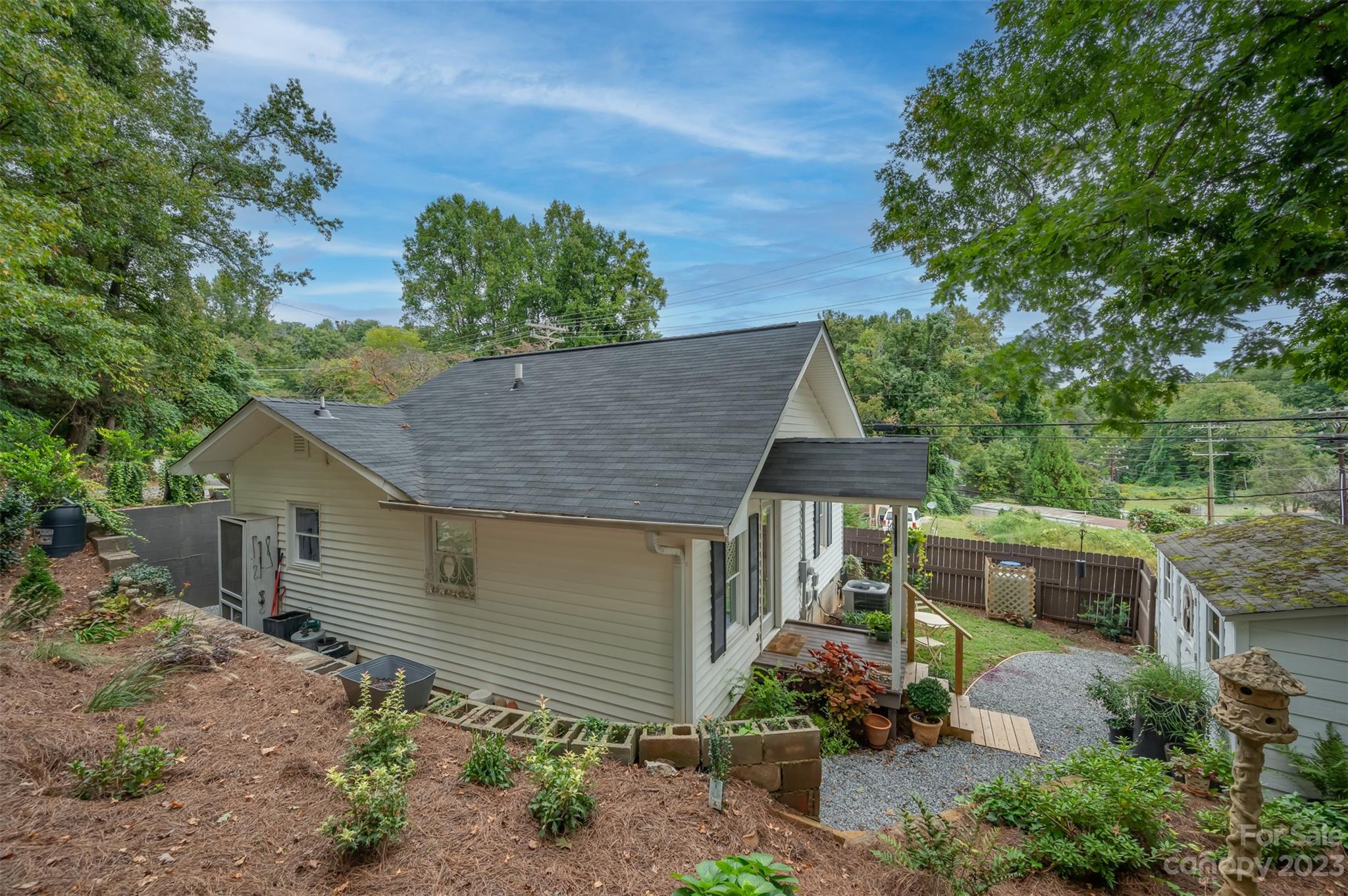 196 Screven Road Tryon, NC 28782 - Photo 28 of 31 a front view of a house with a yard