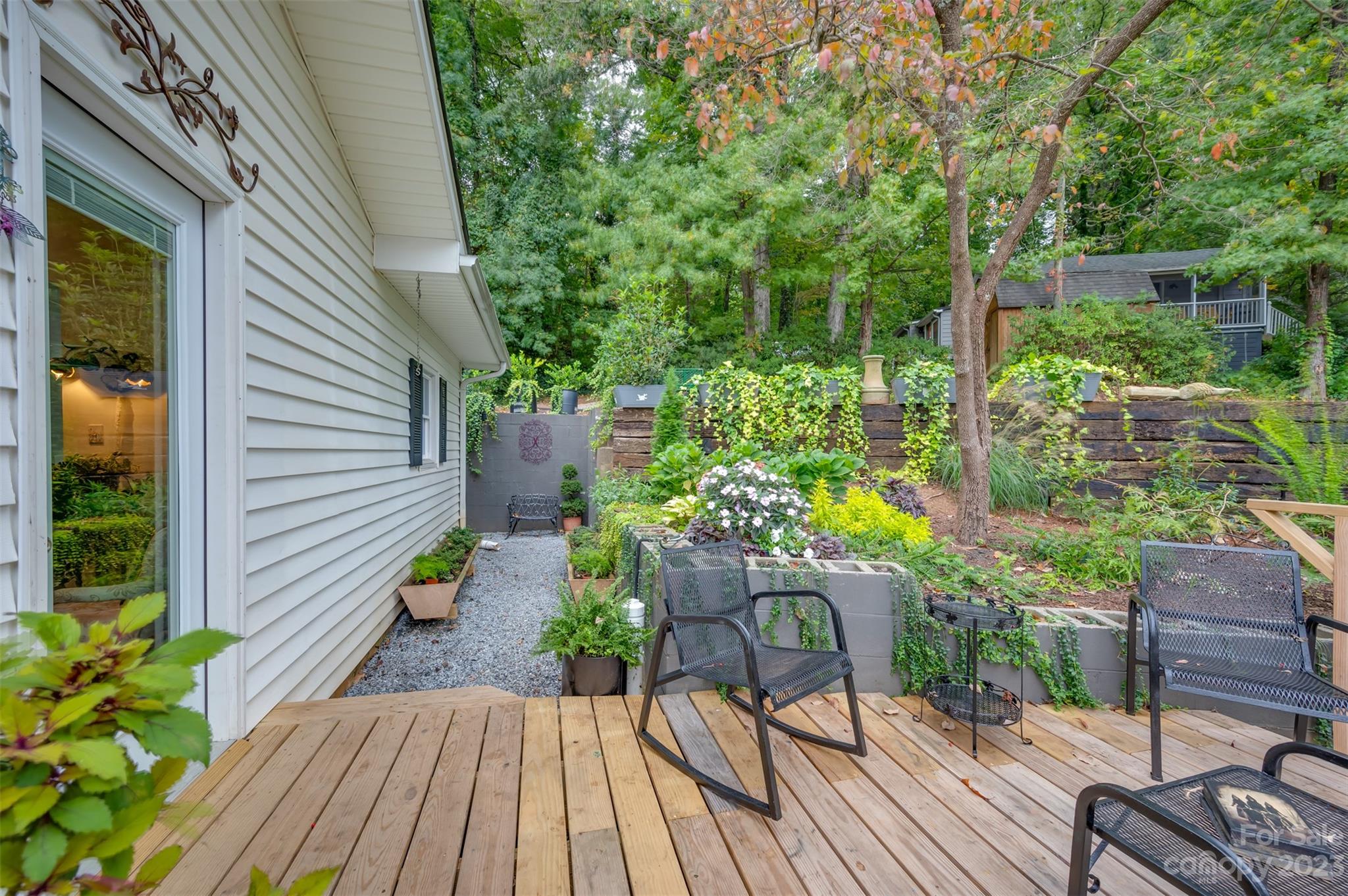 196 Screven Road Tryon, NC 28782 - Photo 5 of 31 a view of balcony with wooden floor and seating space