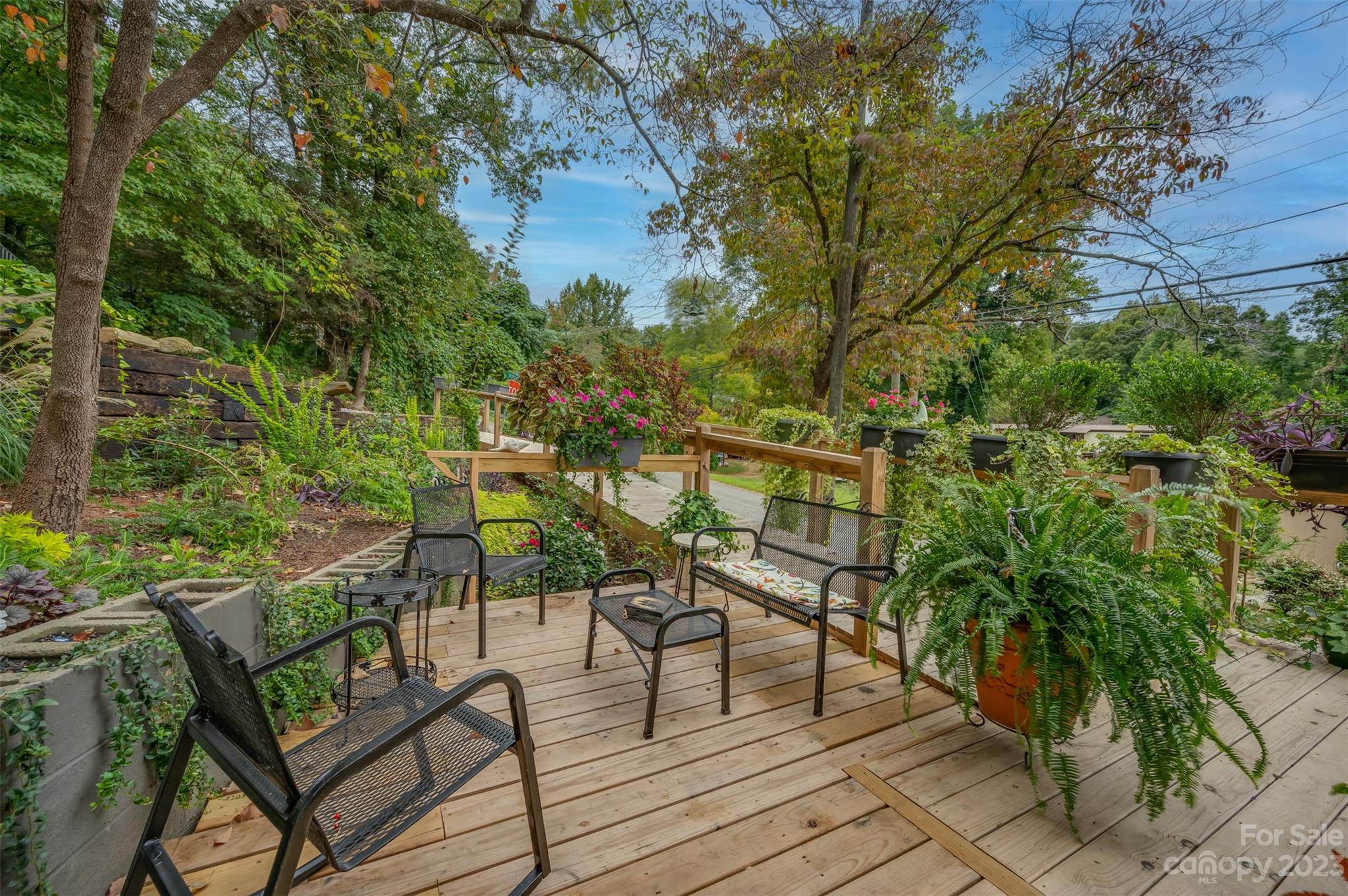 196 Screven Road Tryon, NC 28782 - Photo 6 of 31 a view of a chairs and table on the patio