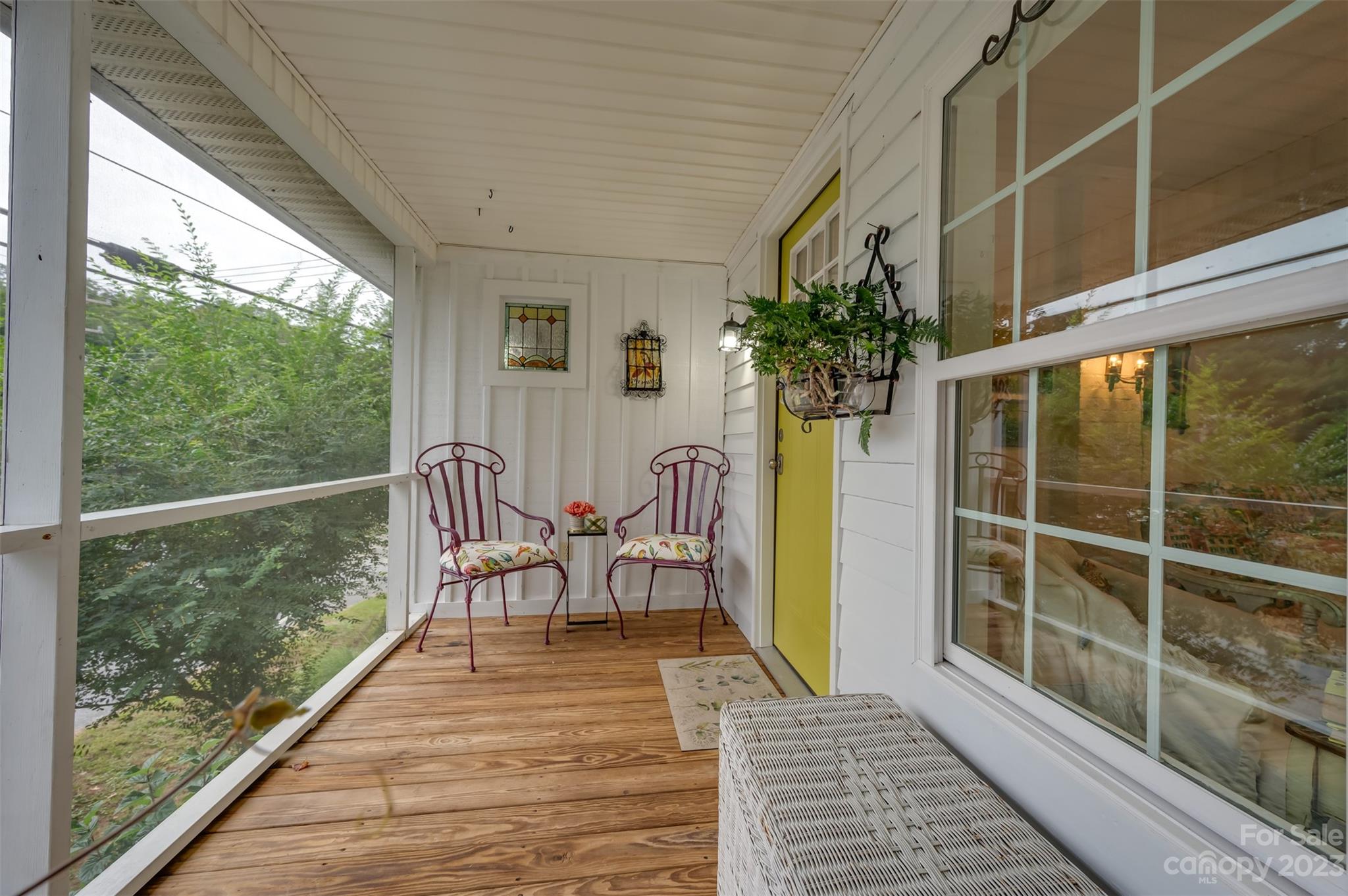 196 Screven Road Tryon, NC 28782 - Photo 7 of 31 a view of a balcony with table and chairs