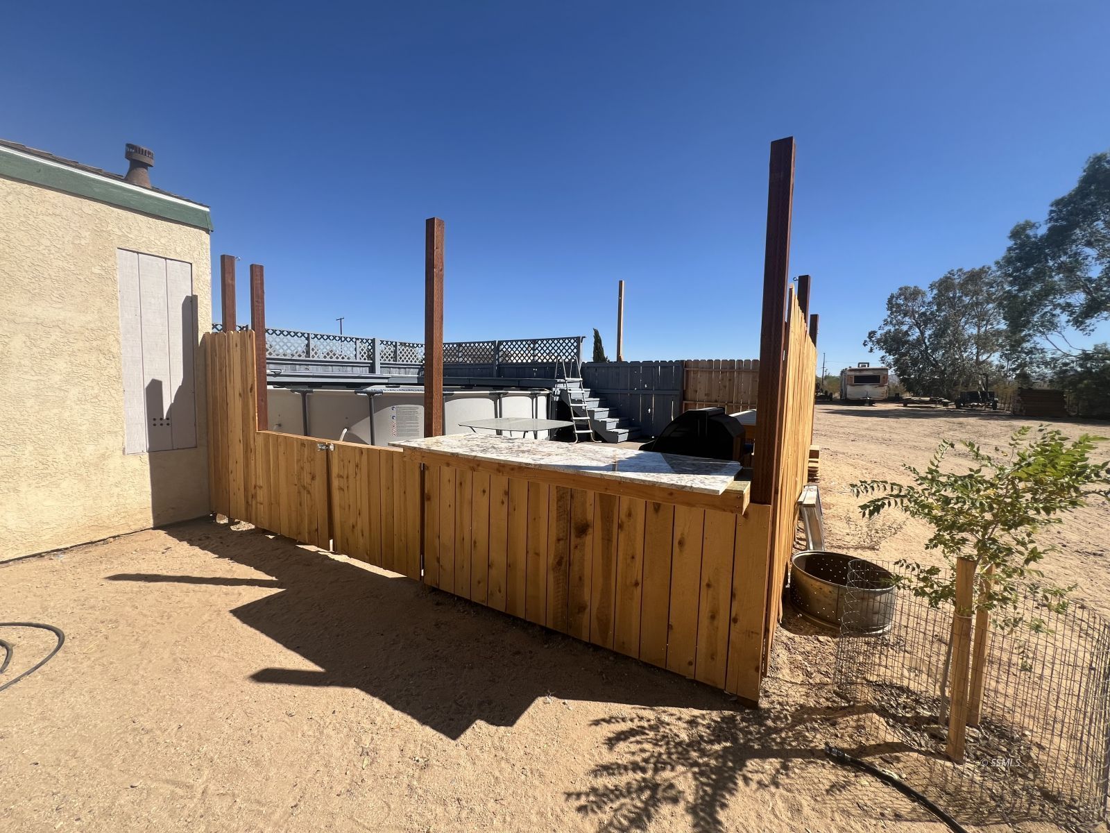 1341 North Calvert Boulevard Ridgecrest, CA 93555 - Photo 19 of 21 a view of a terrace with chairs