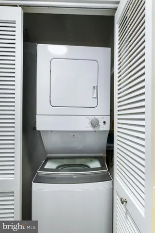a utility room with washer and dryer