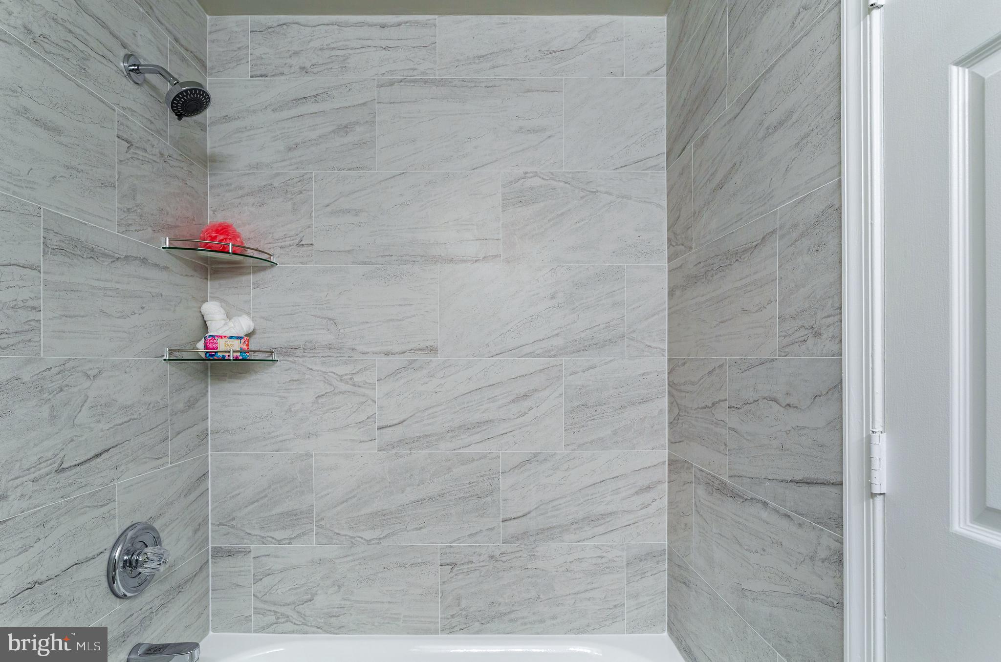 1621 T Street Northwest, Unit 305 Washington, DC 20009 - Photo 28 of 33 a bathroom with a shower