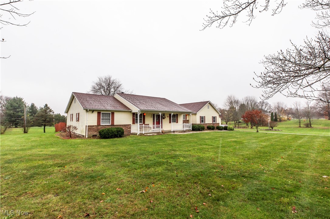 3680 Work Road Ravenna, OH 44266 - Photo 6 of 19 Single story home featuring a porch and a front yard