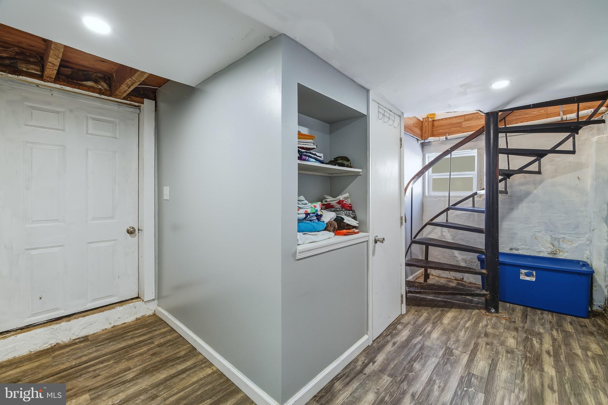 353 Turkey Knob Road Quicksburg, VA 22847 - Photo 16 of 35 a view of entryway with stairs and wooden floor