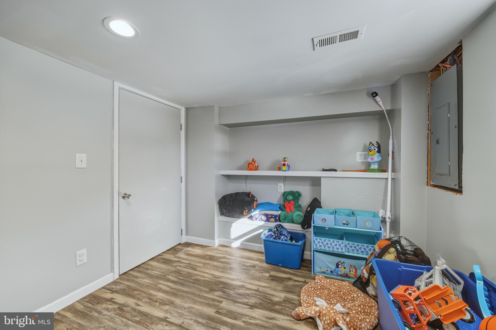 353 Turkey Knob Road Quicksburg, VA 22847 - Photo 19 of 35 a bedroom with bed and a closet