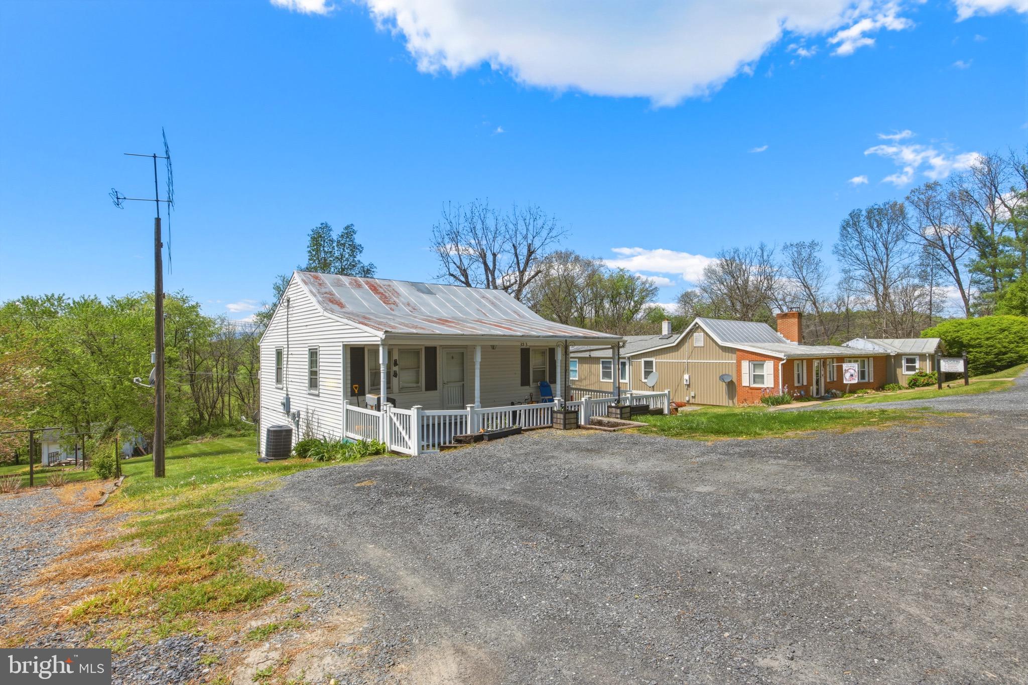353 Turkey Knob Road Quicksburg, VA 22847 - Photo 2 of 35 a view of a house with a big yard