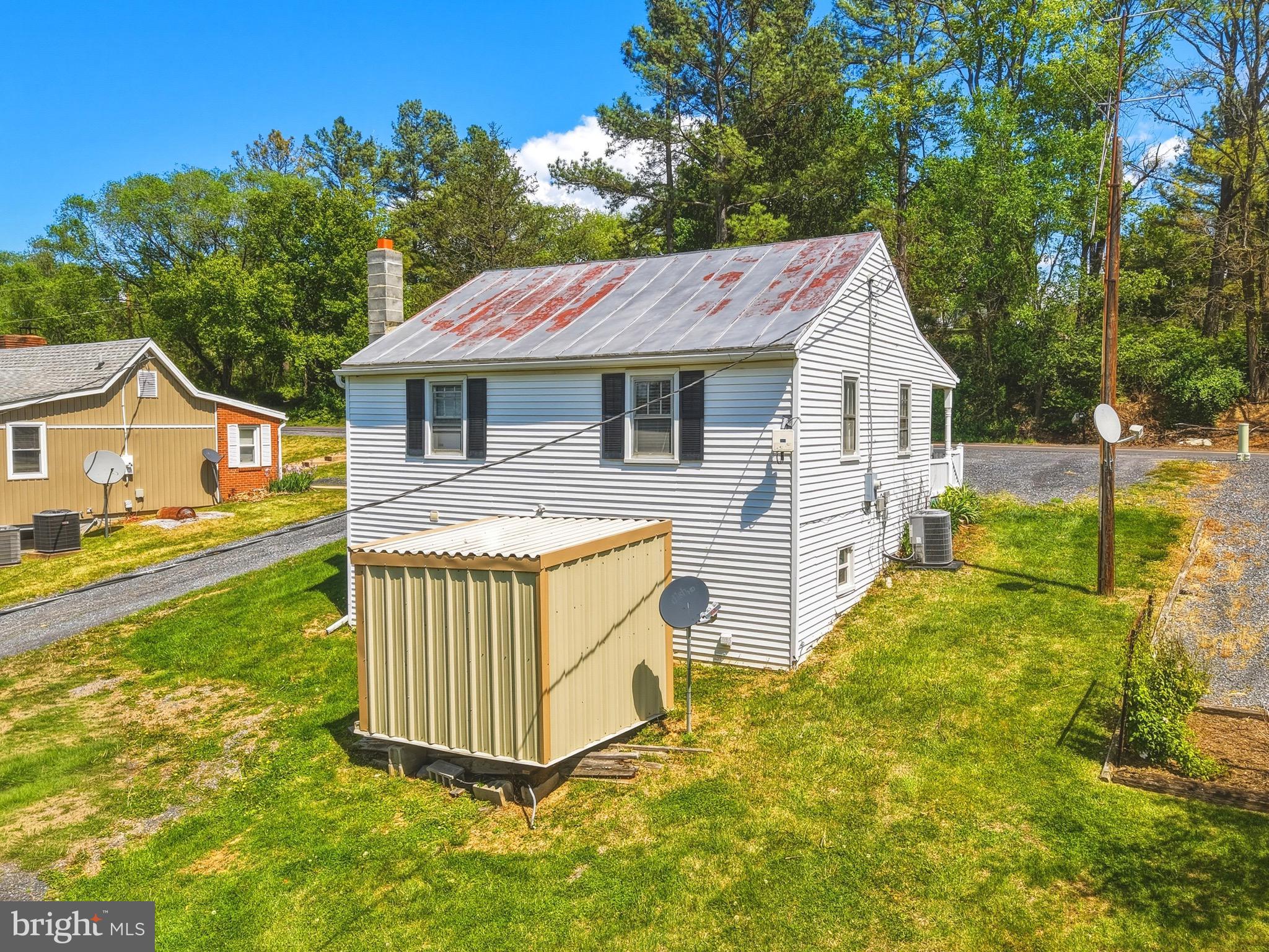 353 Turkey Knob Road Quicksburg, VA 22847 - Photo 24 of 35 a view of a house with a yard and deck