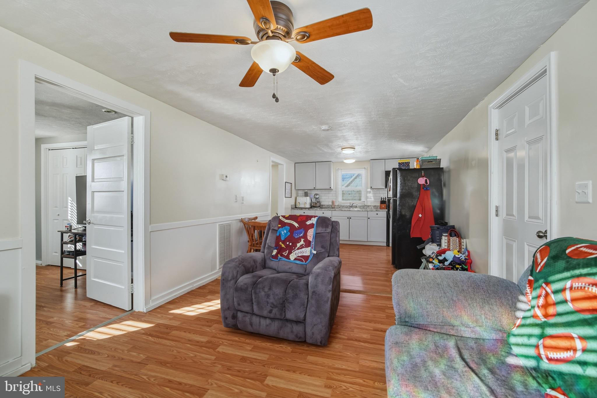 353 Turkey Knob Road Quicksburg, VA 22847 - Photo 6 of 35 a living room with furniture and a gym equipment