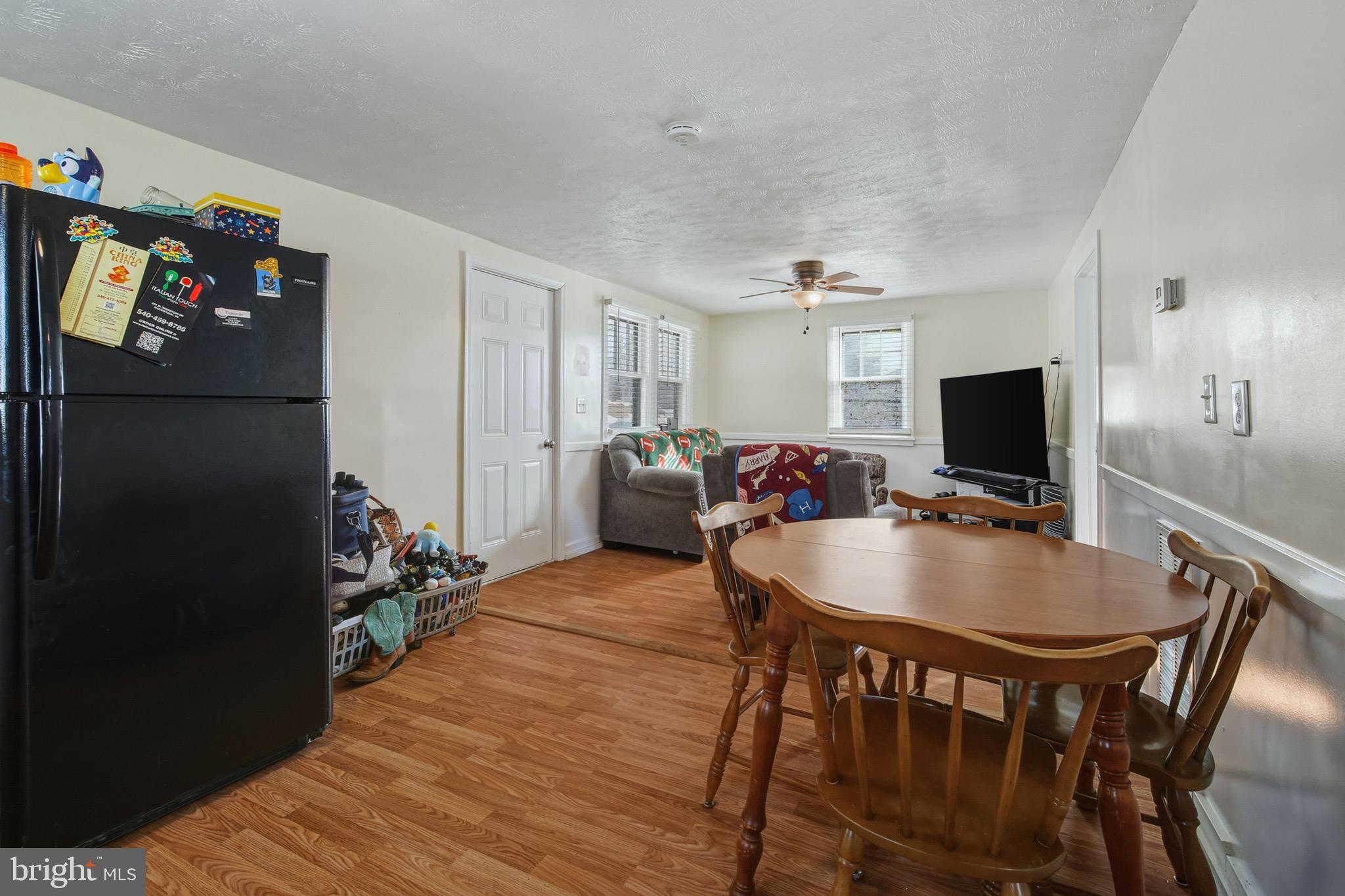 353 Turkey Knob Road Quicksburg, VA 22847 - Photo 8 of 35 a view of a dining room with furniture