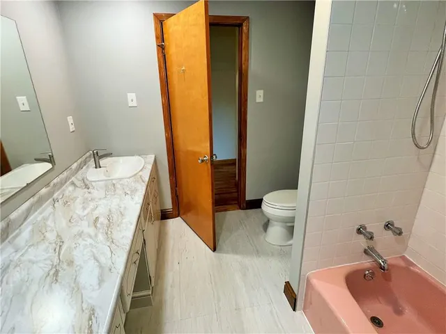 a view of a backyard of the house