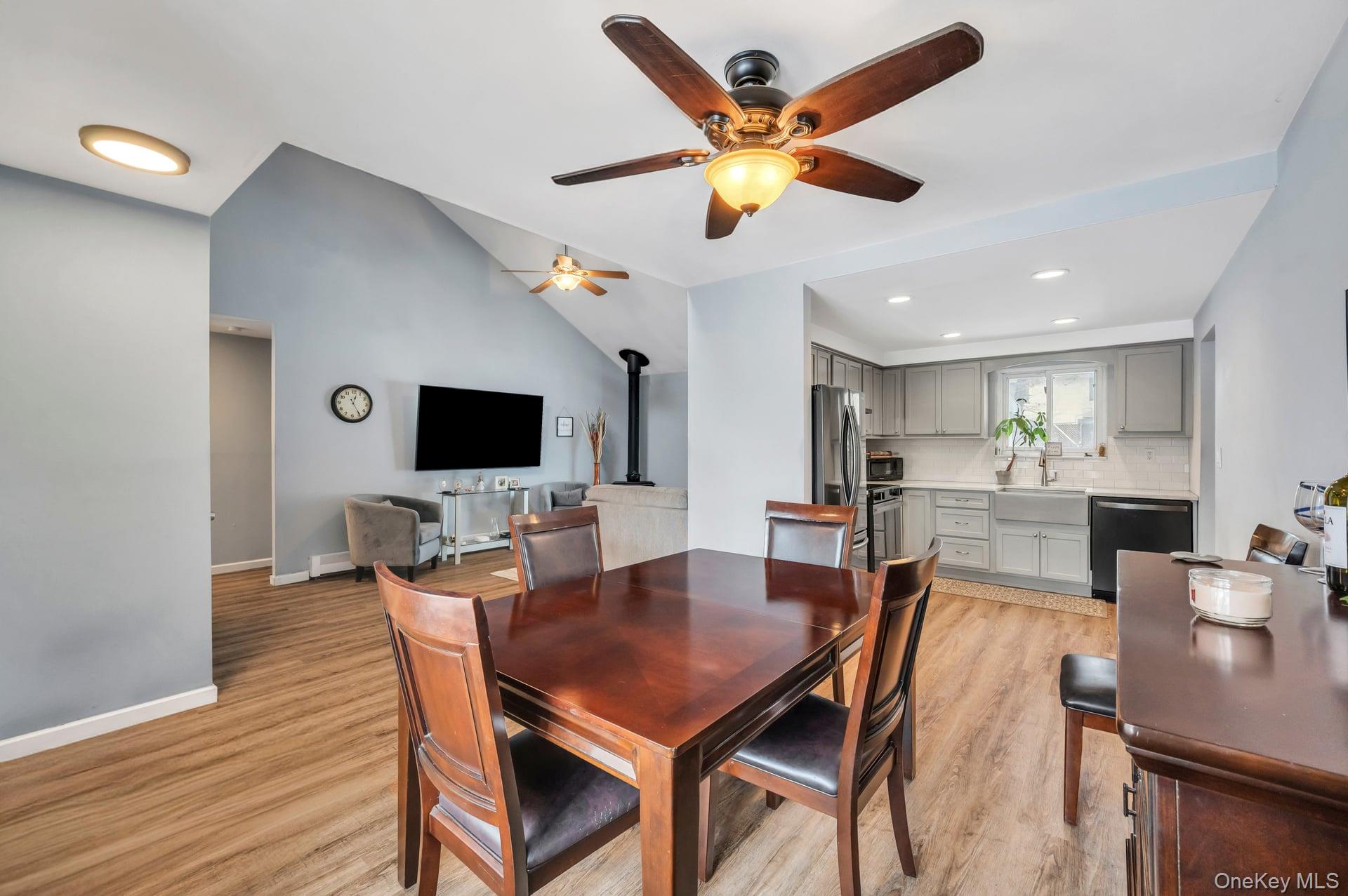 17 Groton Lane Coram, NY 11727 - Photo 14 of 34 a view of a dining room with furniture