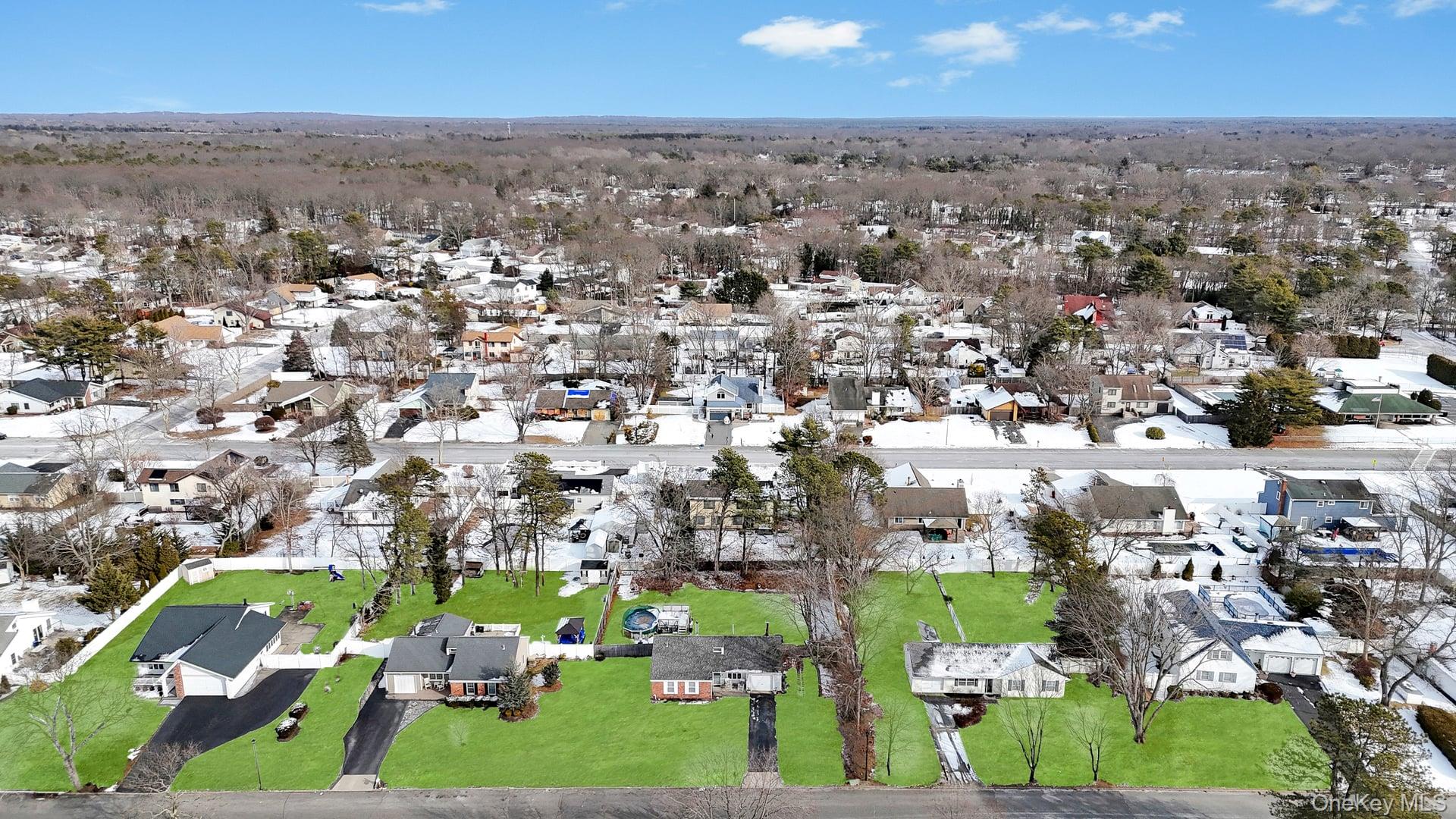 17 Groton Lane Coram, NY 11727 - Photo 2 of 34 an aerial view of residential houses with outdoor space