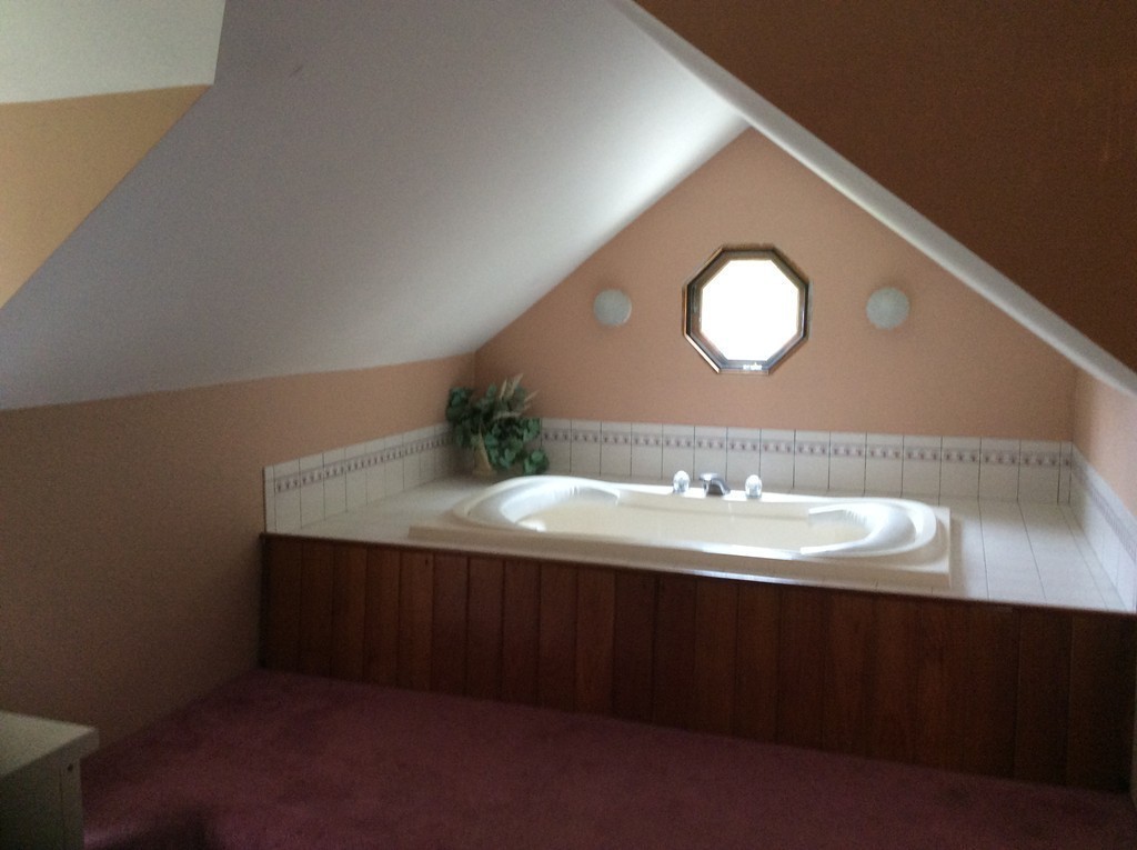 51 Allen Road Billerica, MA 01821 - Photo 11 of 24 a bathroom with a sink and a mirror