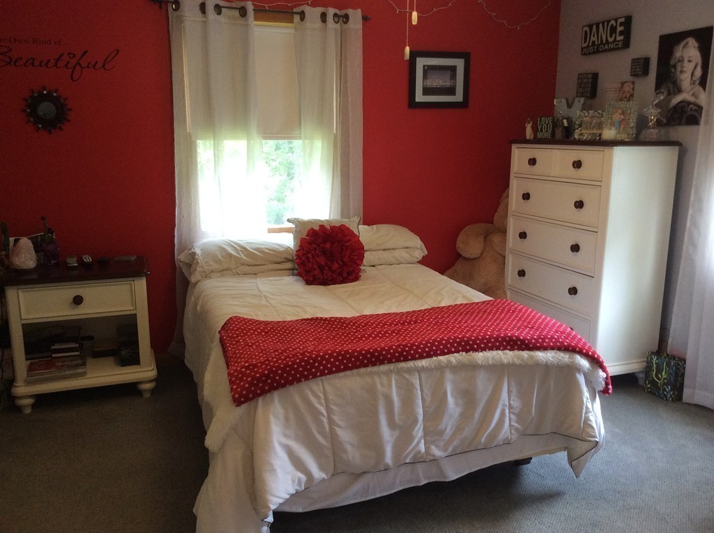 51 Allen Road Billerica, MA 01821 - Photo 12 of 24 a bedroom with a bed and a window