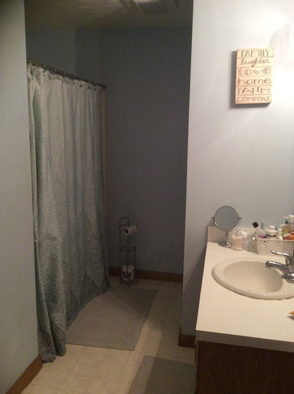 51 Allen Road Billerica, MA 01821 - Photo 15 of 24 a bathroom with a sink and a toilet
