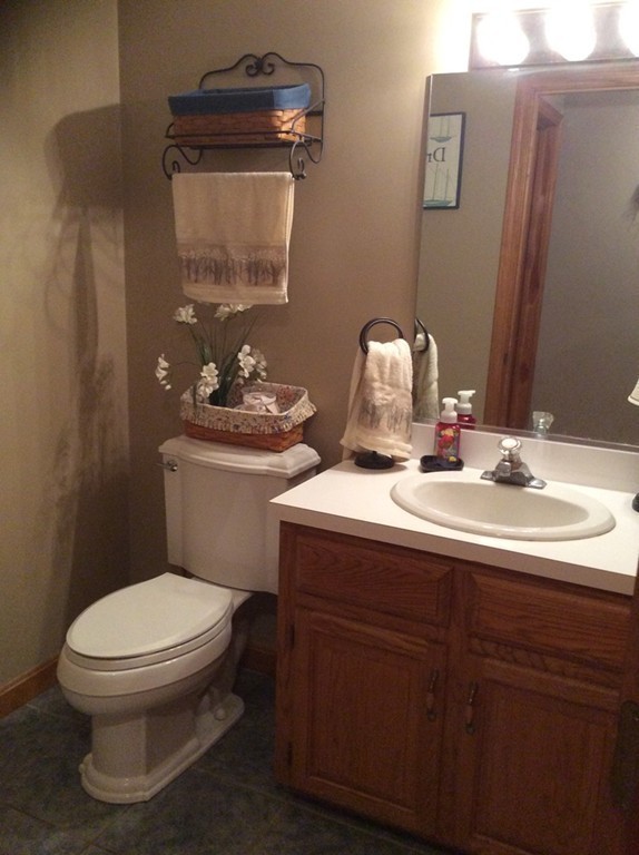 51 Allen Road Billerica, MA 01821 - Photo 16 of 24 a bathroom with a toilet sink and mirror