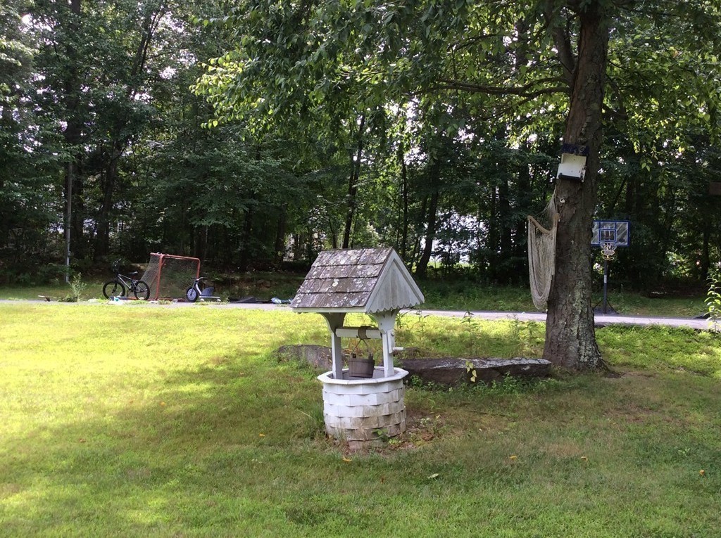 51 Allen Road Billerica, MA 01821 - Photo 19 of 24 a garden view with a fountain