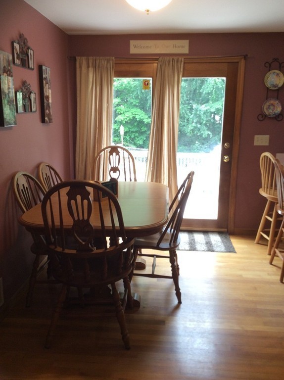 51 Allen Road Billerica, MA 01821 - Photo 4 of 24 a view of a dining room with furniture window and outside view