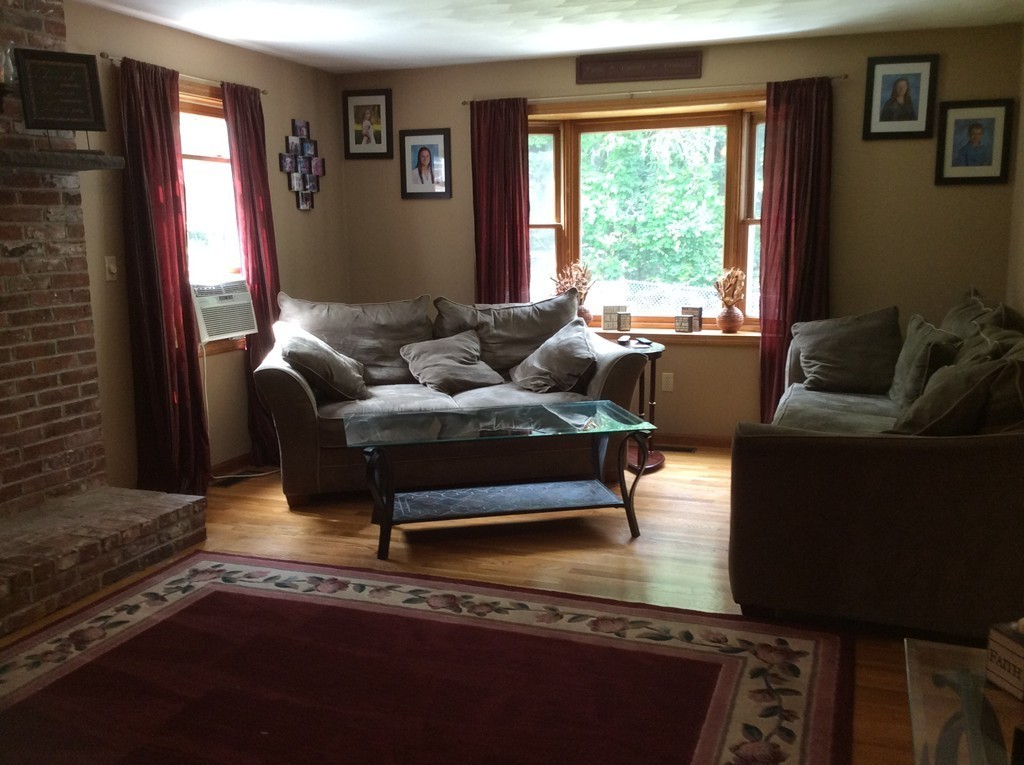 51 Allen Road Billerica, MA 01821 - Photo 7 of 24 a living room with furniture and a large window