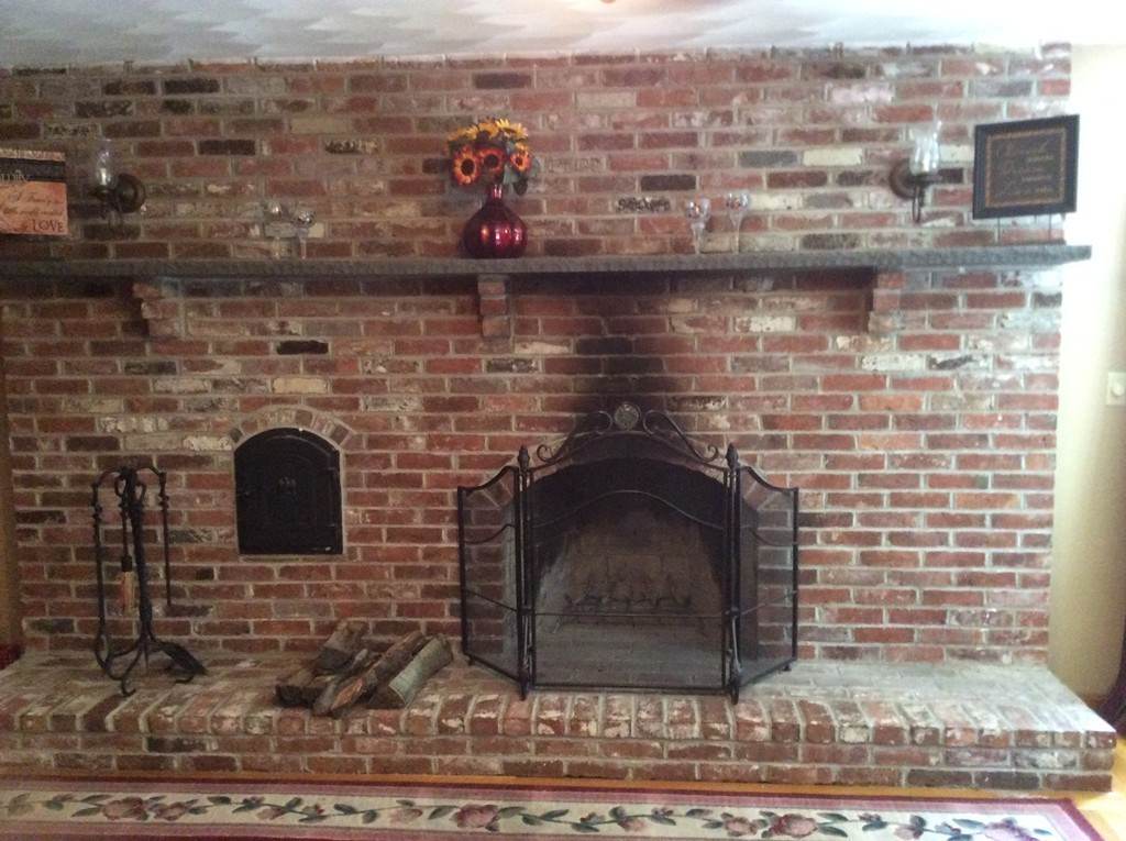 51 Allen Road Billerica, MA 01821 - Photo 8 of 24 a brick building with a fireplace