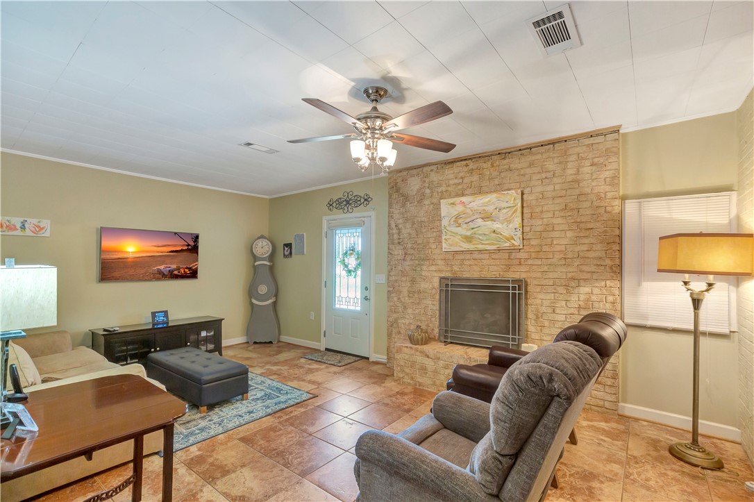 304 Shadow Lane Seneca, SC 29678 - Photo 17 of 33 Tiled den with fireplace