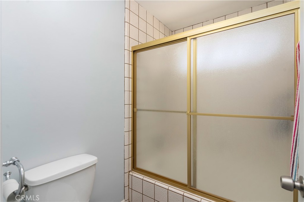 1000 Olive Drive, Unit 40 Bakersfield, CA 93308 - Photo 12 of 16 a bathroom with a shower and a toilet