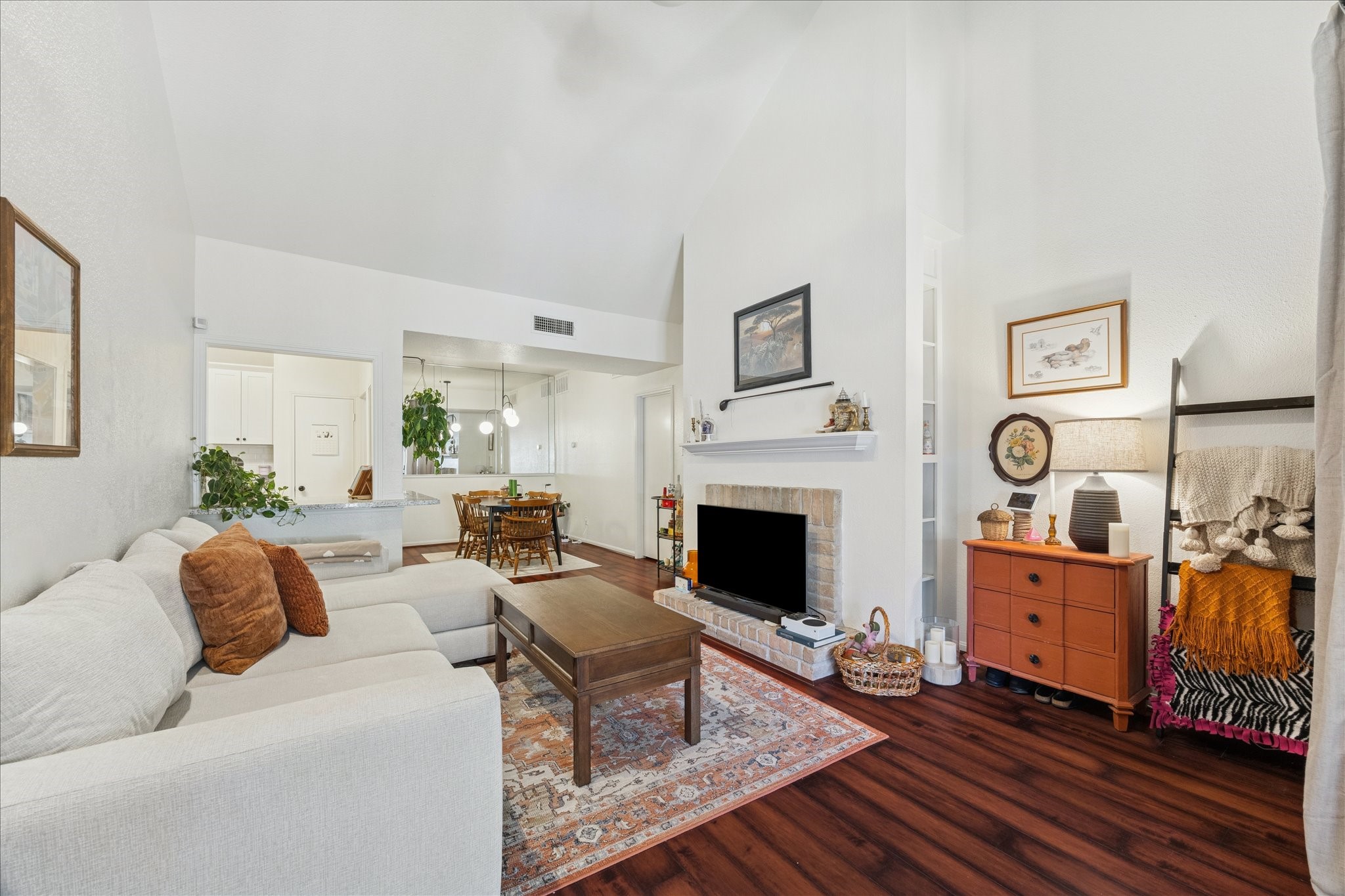 2100 Tanglewilde Street, Unit 318 Houston, TX 77063 - Photo 1 of 16 Bright and open living area with neutral finishes, perfect for relaxing or entertaining.