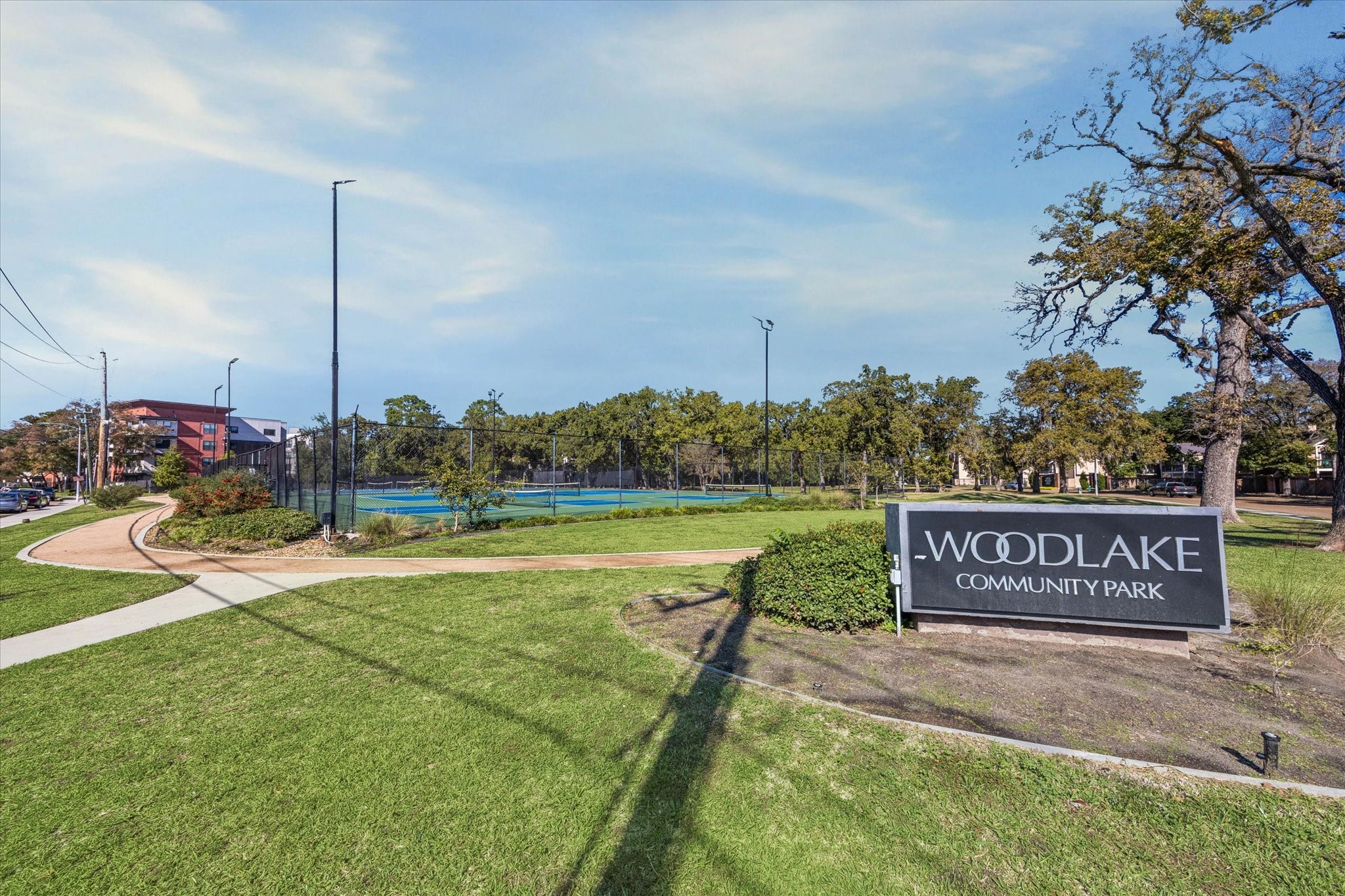 2100 Tanglewilde Street, Unit 318 Houston, TX 77063 - Photo 13 of 16 Enjoy easy access to the neighboring park and green space.