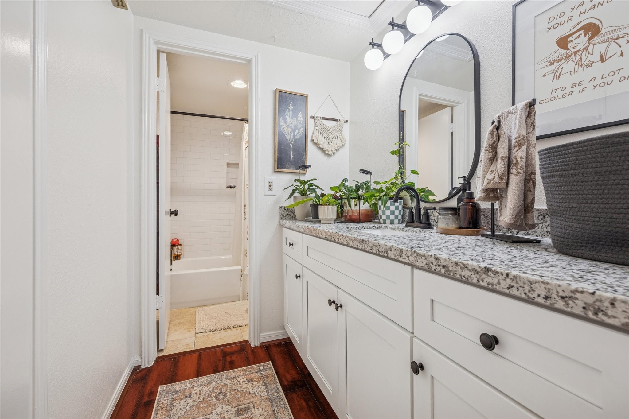2100 Tanglewilde Street, Unit 318 Houston, TX 77063 - Photo 9 of 16 Clean and functional secondary bathroom conveniently located near the second bedroom.