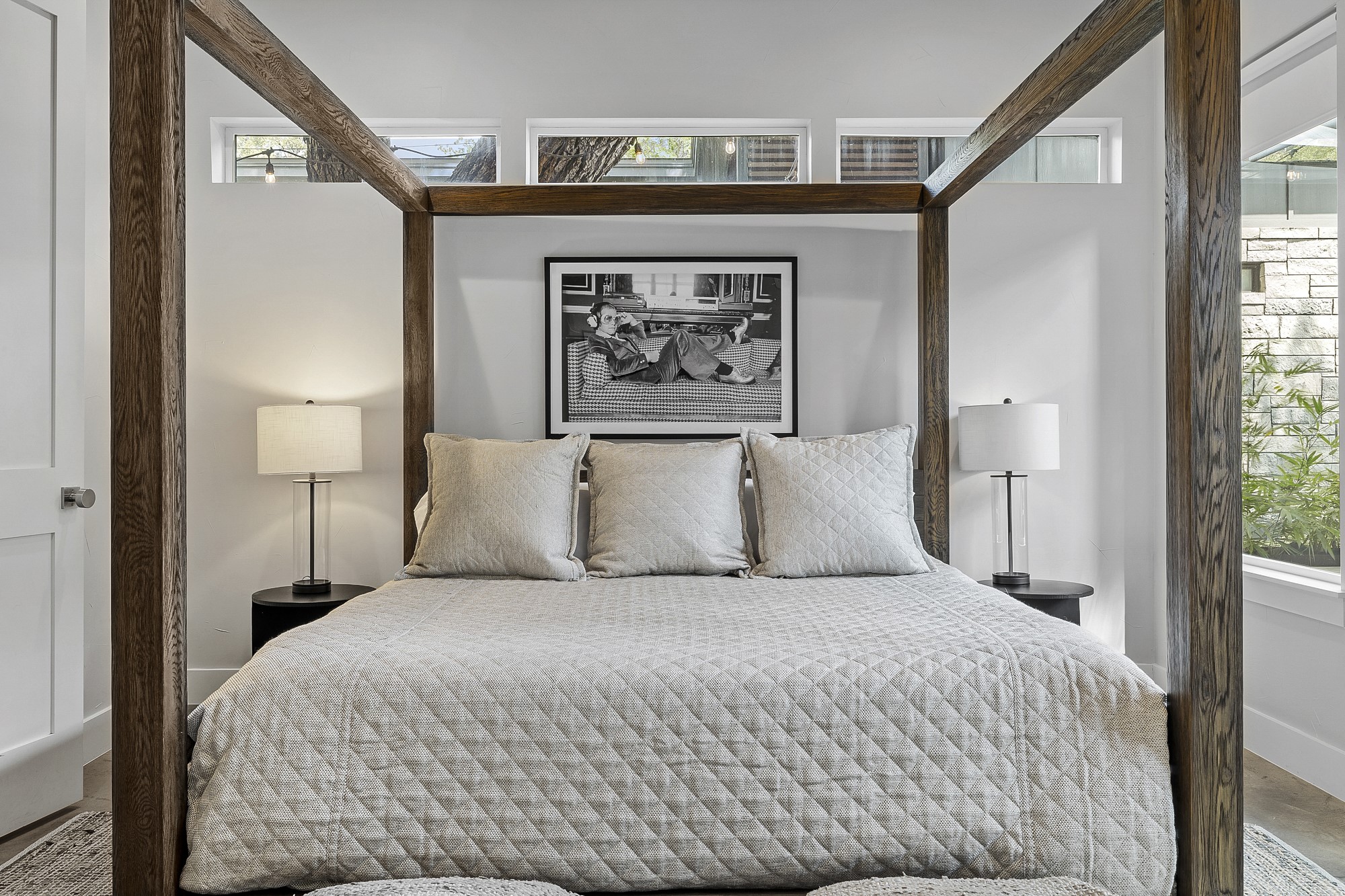 2414 Kinney Road Austin, TX 78704 - Photo 11 of 40 a bedroom with a large bed and a window