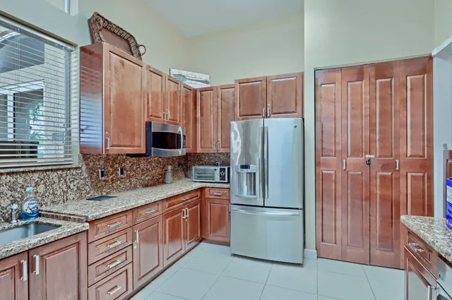 $885,000 | 6802 Houlton Circle, Lake Worth, FL 33467