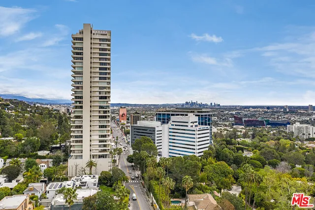 a view of a city with tall buildings