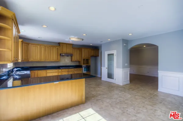 a view of a kitchen with a sink