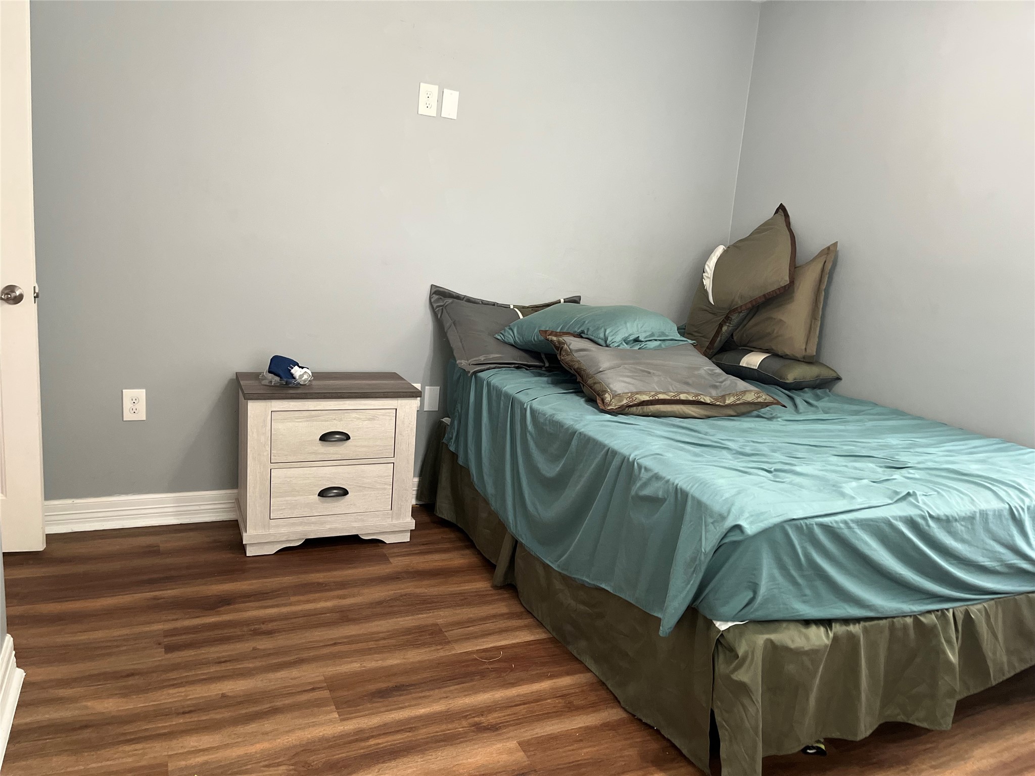 21511 Rio Villa Drive Houston, TX 77049 - Photo 37 of 45 a bedroom with a bed and chair