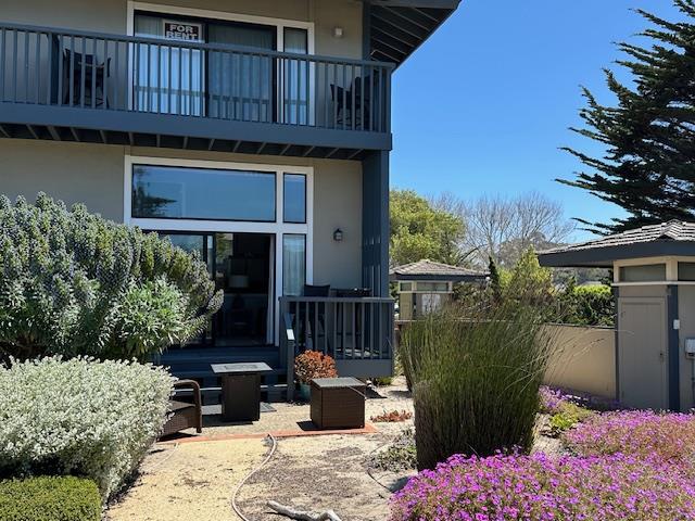 1 La Playa Street Monterey, CA 93940 - Photo 1 of 17 a view of a chairs and table in the back yard of the house