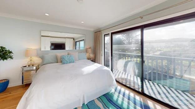 1 La Playa Street Monterey, CA 93940 - Photo 12 of 17 a bedroom with a bed and a large window